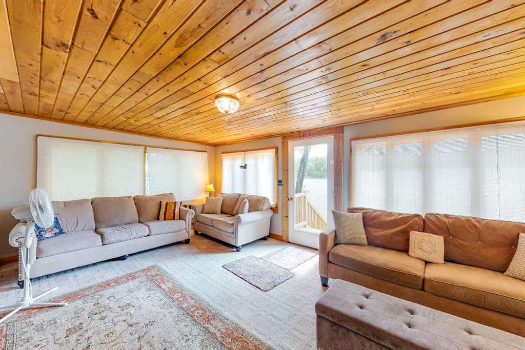 Lakefront cabin with private dock, wood stove, firepit, deck, & grill - 1 dog ok