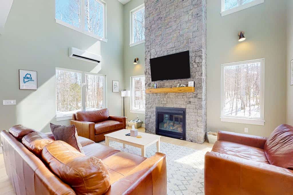 Mountain escape with a hot tub, game room, four bedrooms, & gas fireplace