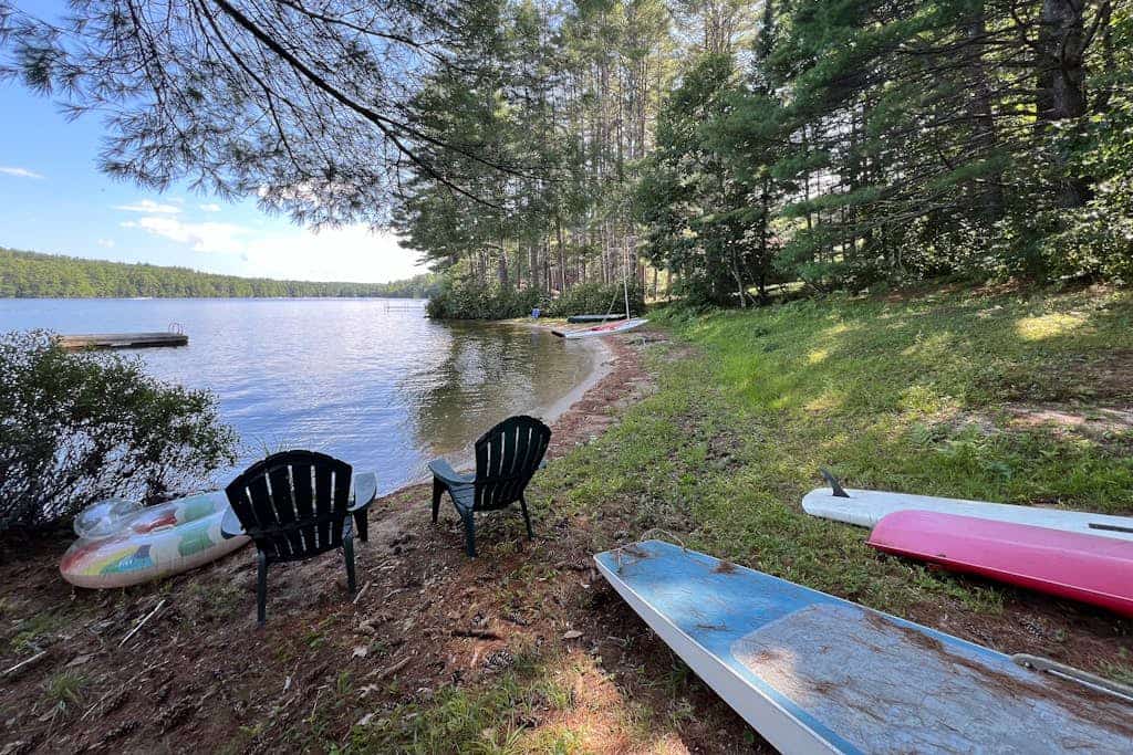 Tranquil Lakefront Retreat with Private Beach and Spacious Living