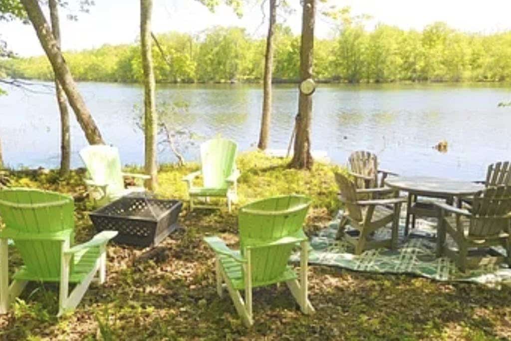 Spacious river home w/ pellet stove, outdoor dining area, fire pit, & BBQ grill