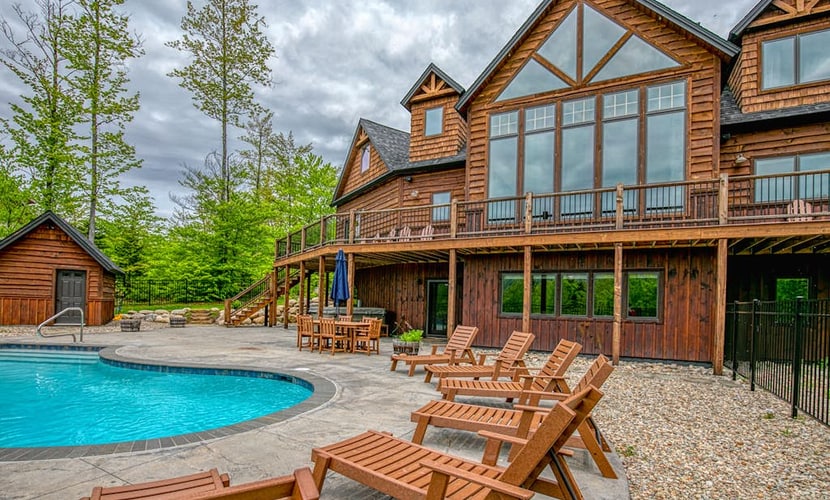 Elegant mountain-view home with private hot tub, saltwater pool & foosball