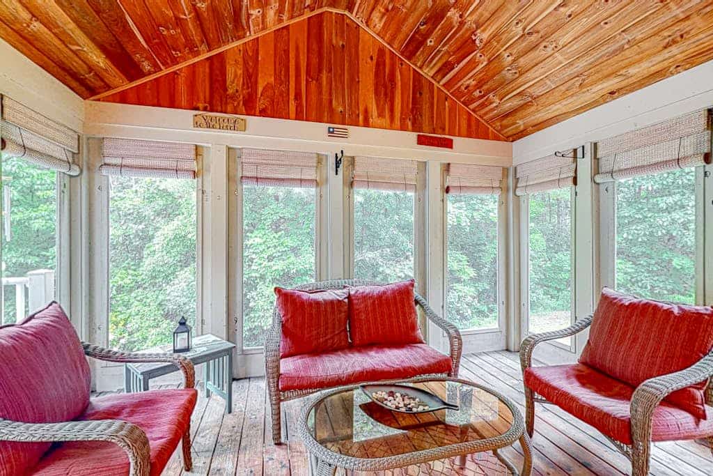 Waterfront home with a fireplace, grill, deck, washer/dryer, & AC - dog-friendly