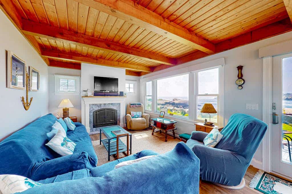 Oceanfront home with stunning views of the cove & sunset, steps to the beach