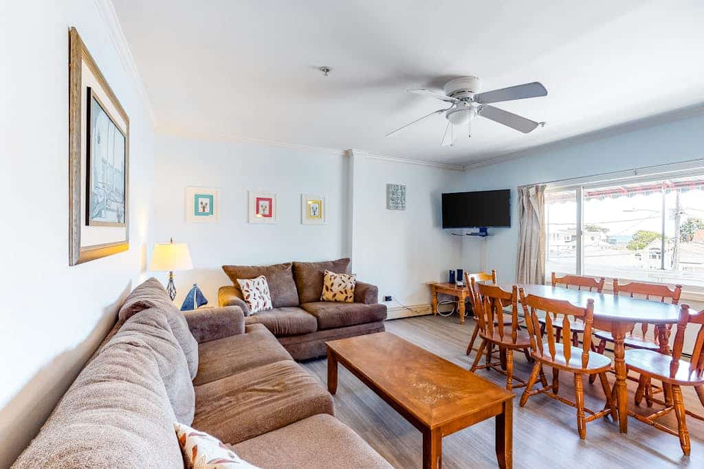 Ocean-view condo with gorgeous sunrises, deck, & WiFi - walk to beach & pier
