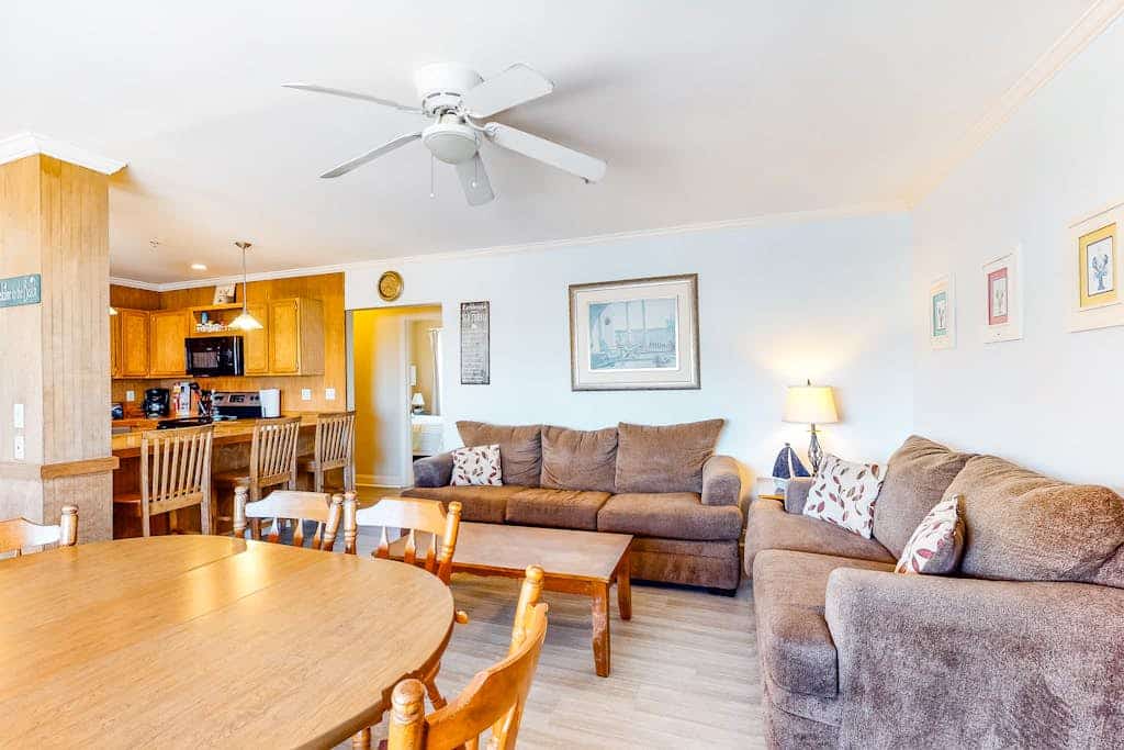 Ocean-view condo with gorgeous sunrises, deck, & WiFi - walk to beach & pier