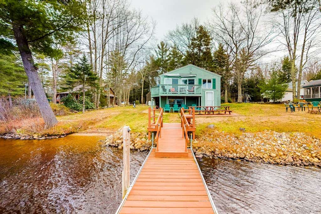 Lovely lakefront home with deck, fire-pit, grill, private dock & pet friendly