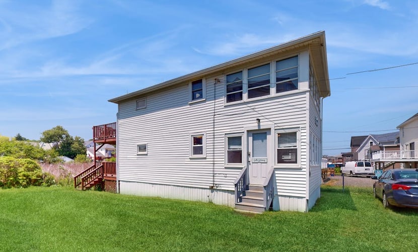 Sun-filled & serene coastal retreat with deck & stunning ocean views - near golf