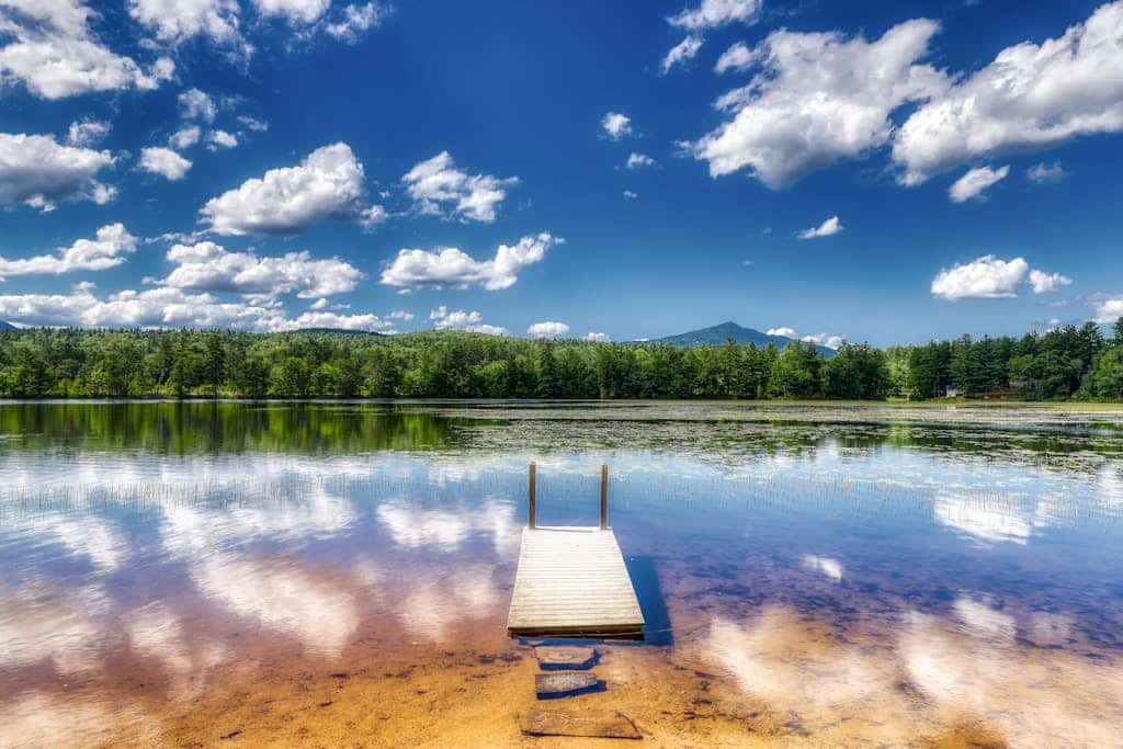 Lakefront home with private beach & dock - close to skiing