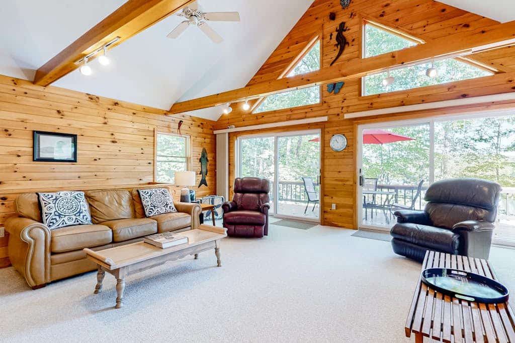 Stunning lakefront home with private dock, deck, firepit, and lake view