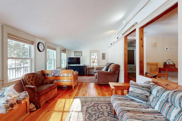 Quaint lakefront home with a fire pit and beautiful views