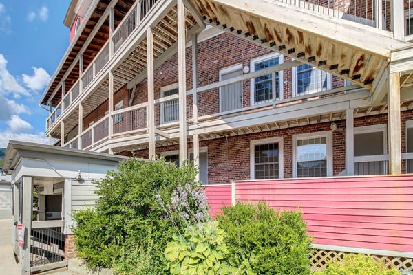 Dog-friendly & riverfront condo one mile from Okemo with wood fireplace