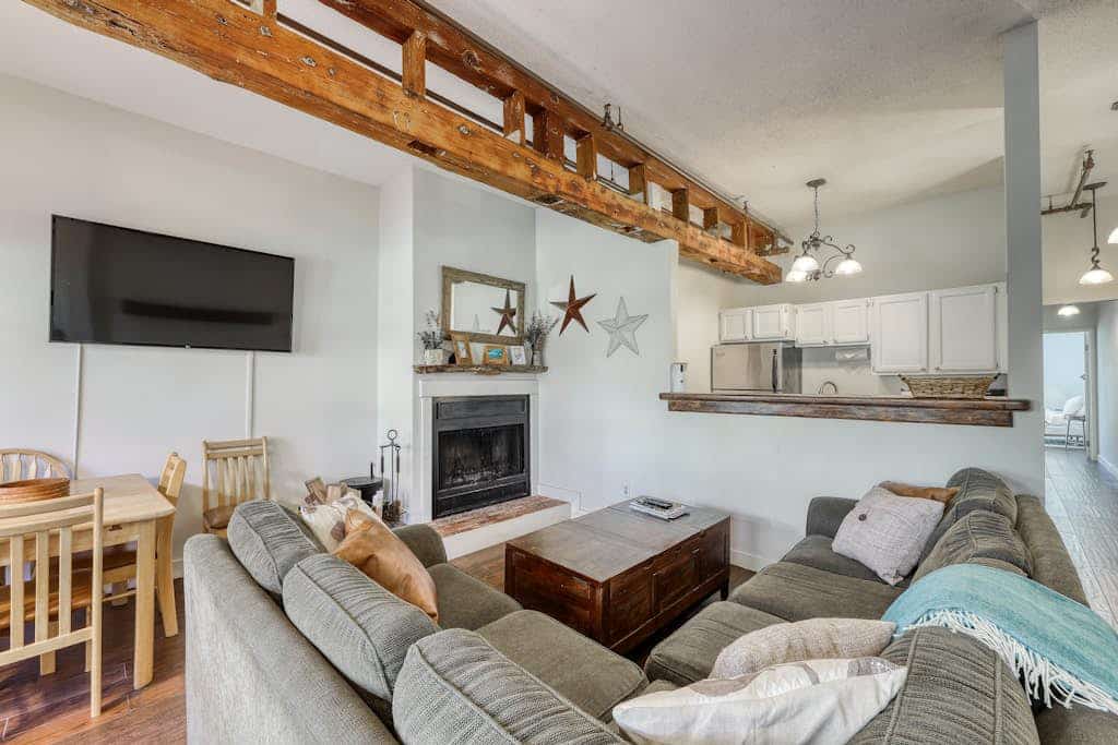Dog-friendly & riverfront condo one mile from Okemo with wood fireplace