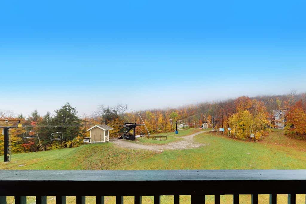 Ski-in/out condo with mountain and lift views, hot tub, & pool