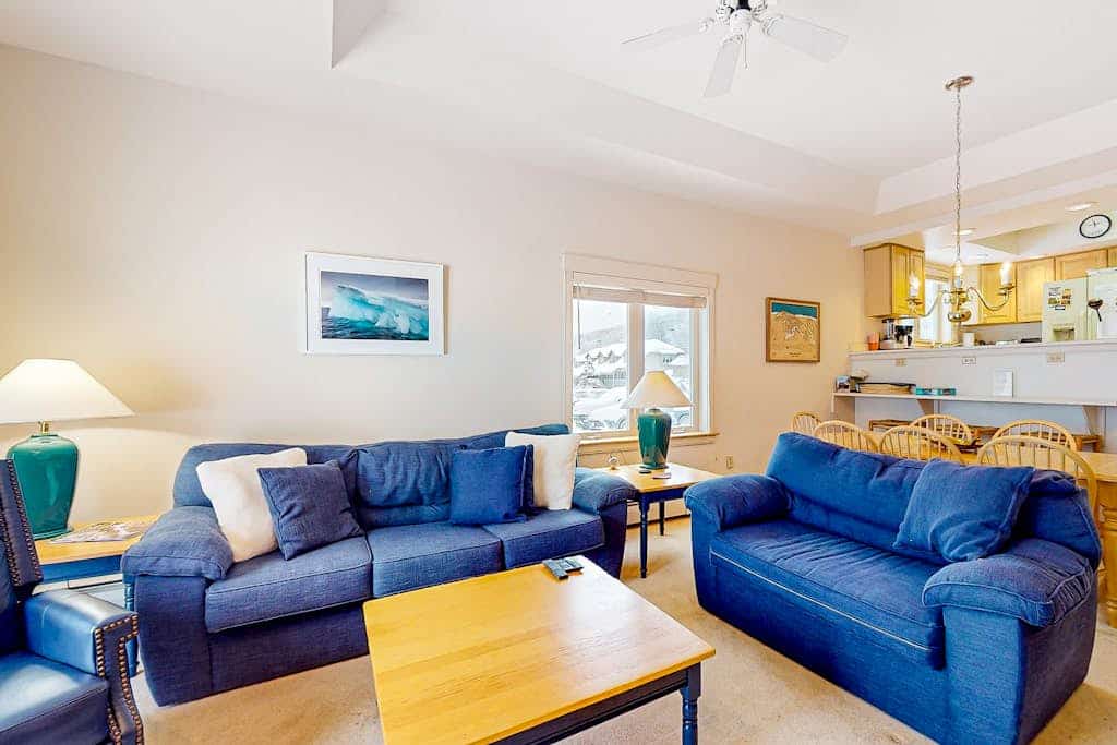 Ski-in/ski-out condo with pool, hot tub, sauna, mountain view, deck, & fireplace