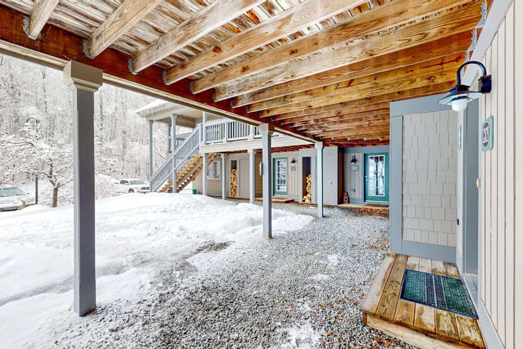 Ski-in/ski-out condo with pool, hot tub, sauna, mountain view, deck, & fireplace