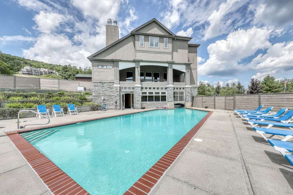 Ski-in/out mountainside condo with pool, hot tub, game room & washer/dryer
