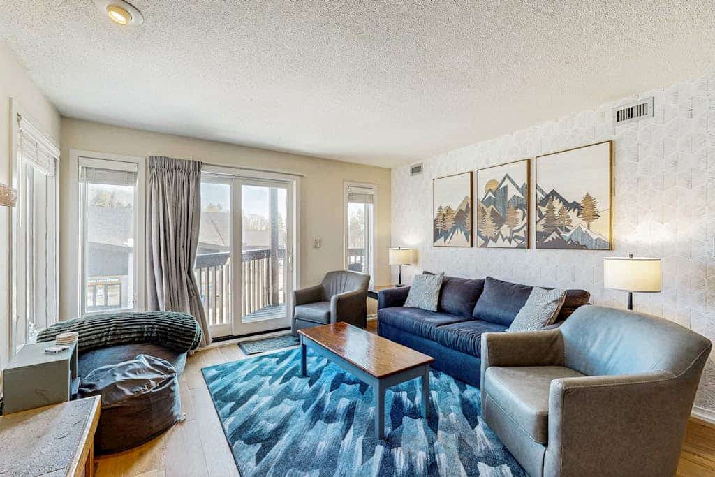 Ski-in/out mountainside condo w/ mountain views, private deck, fireplace, w/d
