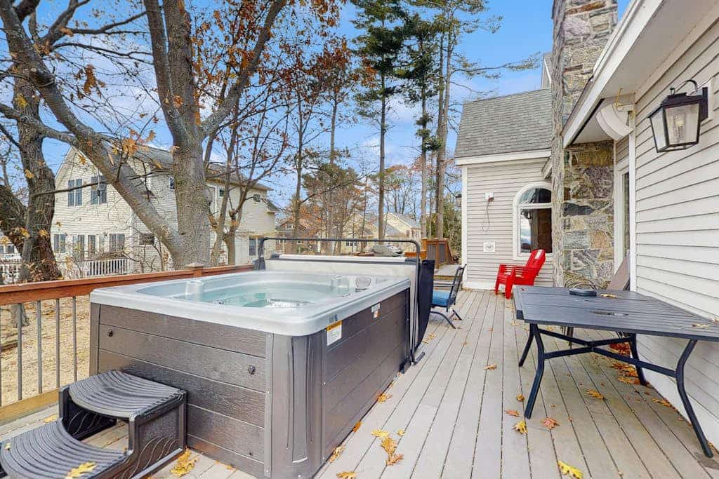 Lakefront home with water access, views of the mountains, private deck & patio