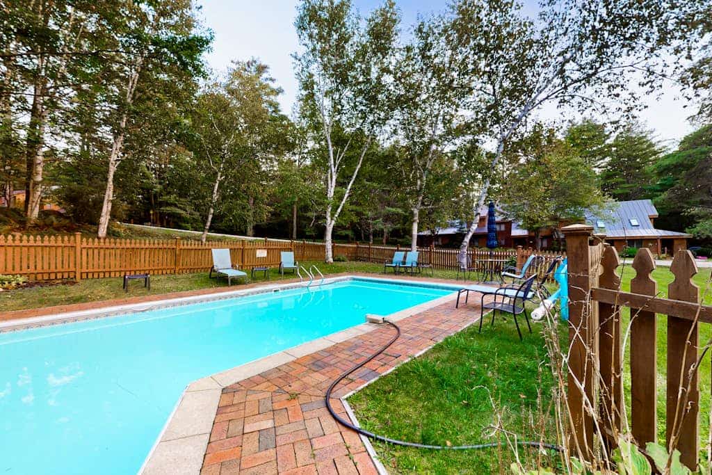 Two-story condo with forest views, Echo Lake beach access, pool, dock & tennis