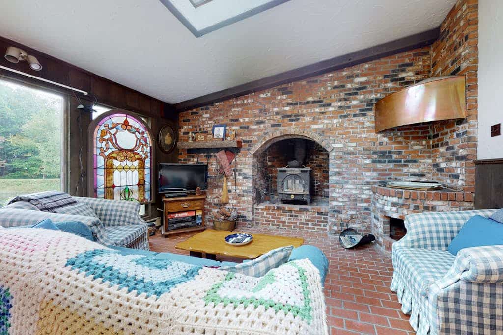 Unique & quaint home with loads of character, firepit, two wood stoves, & grill