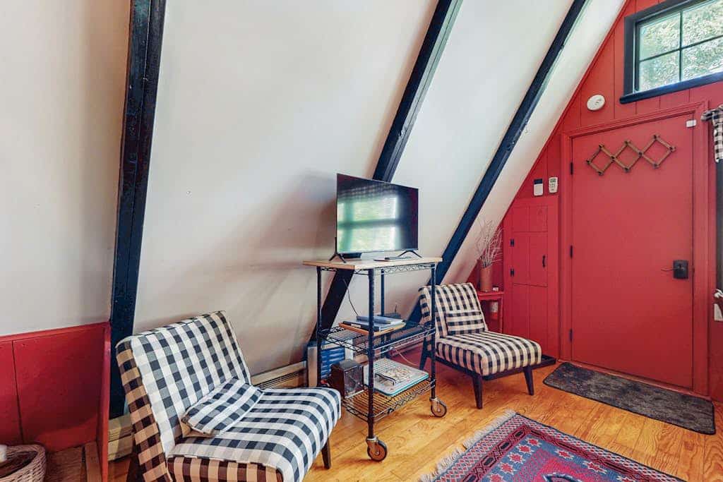 Charming gingerbread A-frame situated on 3 acres, woodstove, A/C, deck