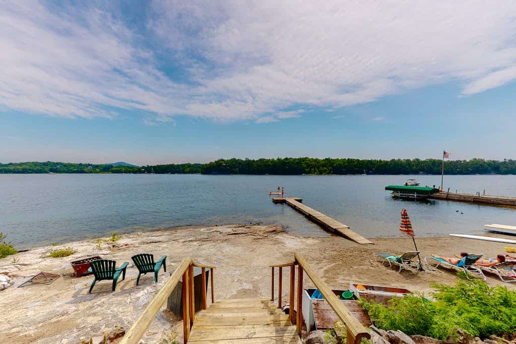 Century-Old Lakefront Victorian on a Private Island—Boats, Beach & Dog-Friendly
