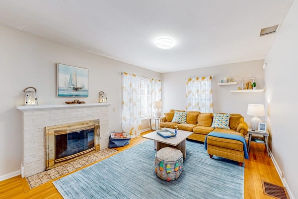 Warm & inviting retreat with a full kitchen, gas fireplace, & furnished patio