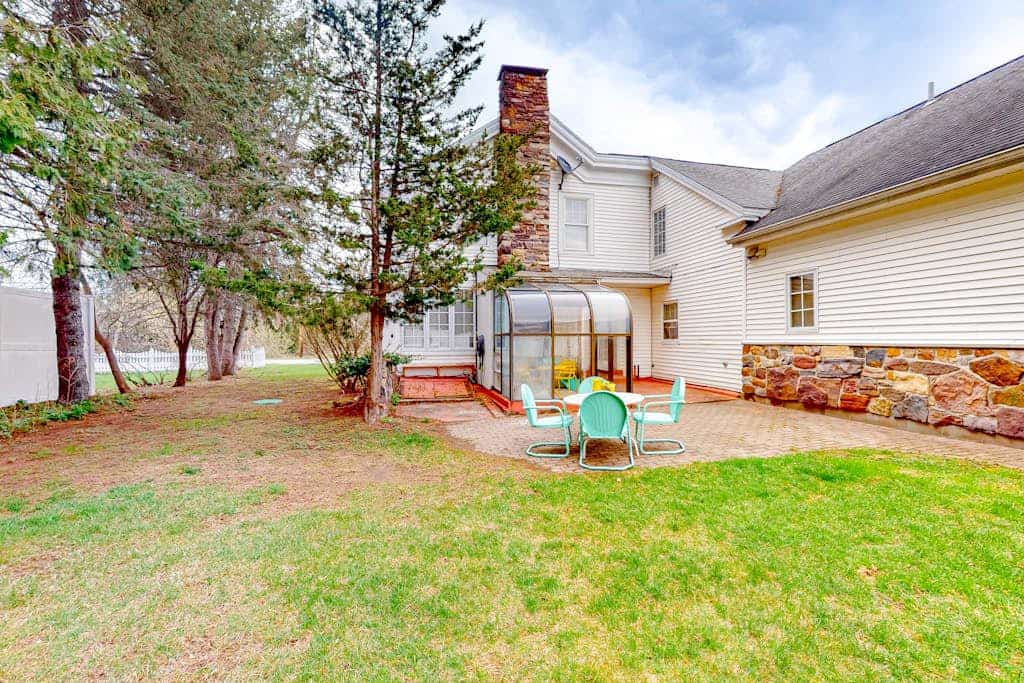 Warm & inviting retreat with a full kitchen, gas fireplace, & furnished patio