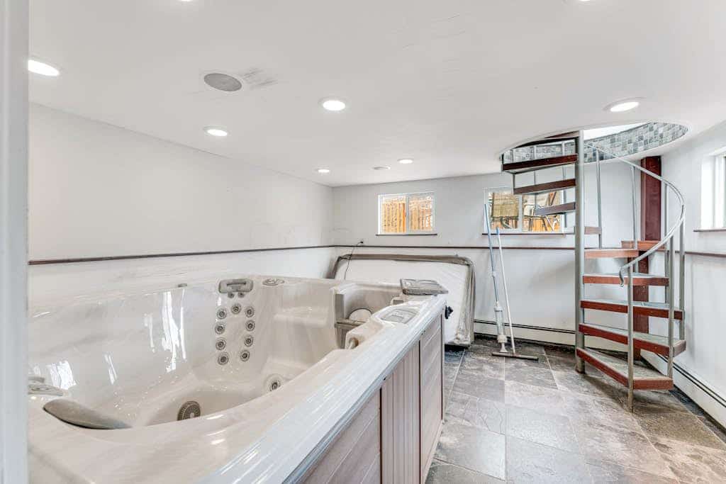 Home on Lake Champlain with hot tub, in-home gym, firepit, & lovely views