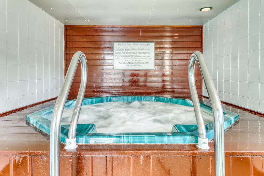 Golf course-front condo with loft, indoor & outdoor pools, hot tub, & game room