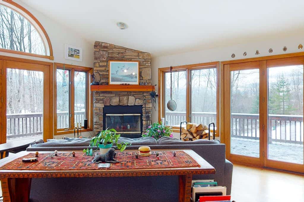 Large home surrounded by trees with wraparound deck & fireplace - near slopes