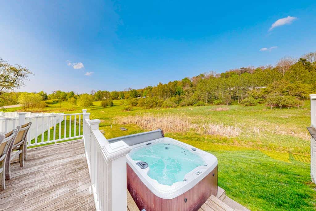 All-season escape in a vintage farmhouse with updated interior & on-site hot tub