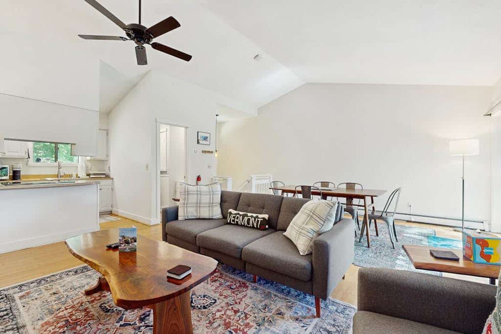 Cozy condo w/ balcony, river view, electric woodstove, w/d, wifi, kitchen, a/c