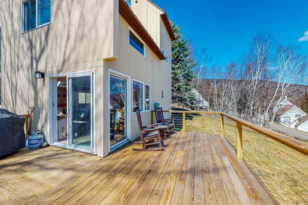 Mountain-view home with new deck, fireplace, & shared pool - walk to lifts