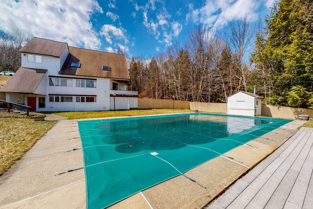 Mountain-view home with new deck, fireplace, & shared pool - walk to lifts