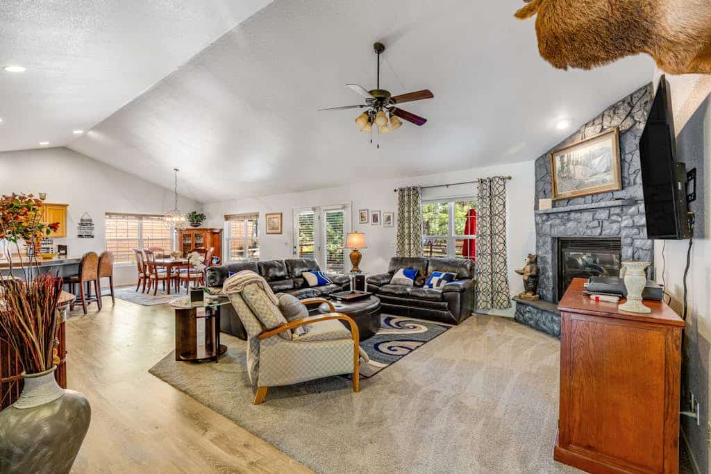 Dog-friendly home with yard, covered porch, fireplace, grill, & W/D