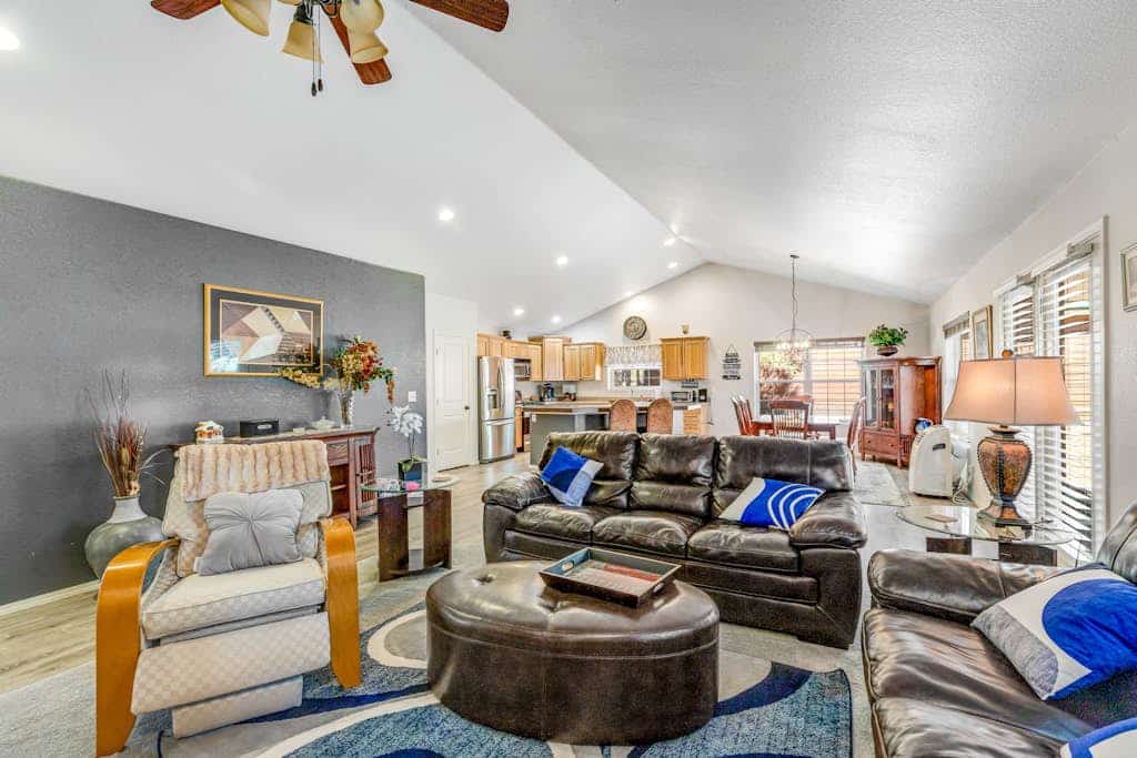 Dog-friendly home with yard, covered porch, fireplace, grill, & W/D