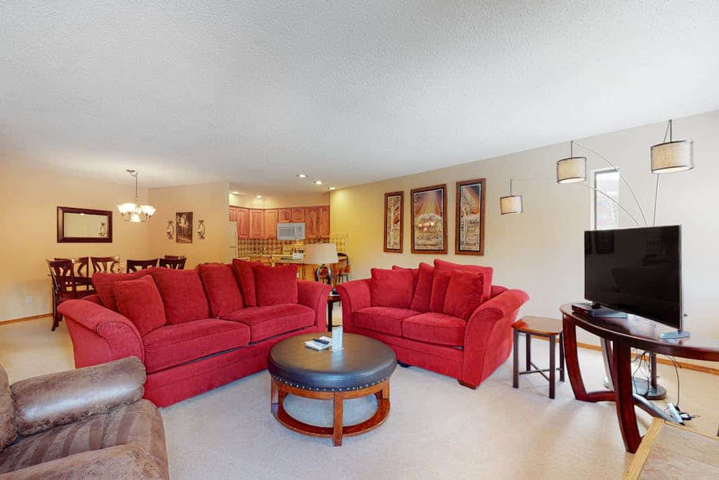 Stunning ski-in/out condo with hot tubs, fireplace, balcony, & gym