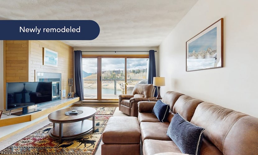Lakefront retreat with mountain views, covered parking & updated interiors