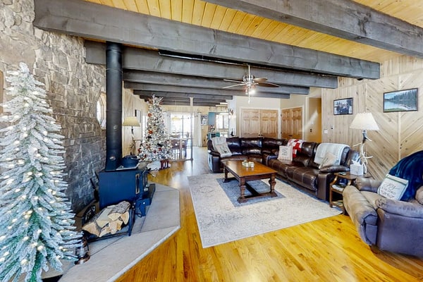 River view retreat with mountain views - hot tub, balcony, wood stove & W/D