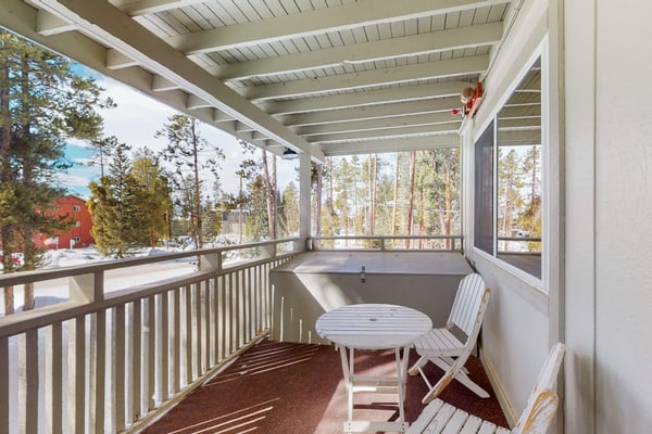 Beautiful mountain-view condo with hot tubs, heated pool, fireplace, pool table