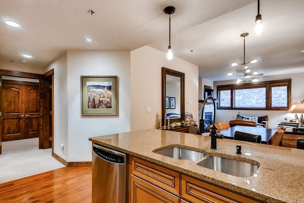 Breckenridge villa with open layout, fireplace, hot tub, & resort amenities