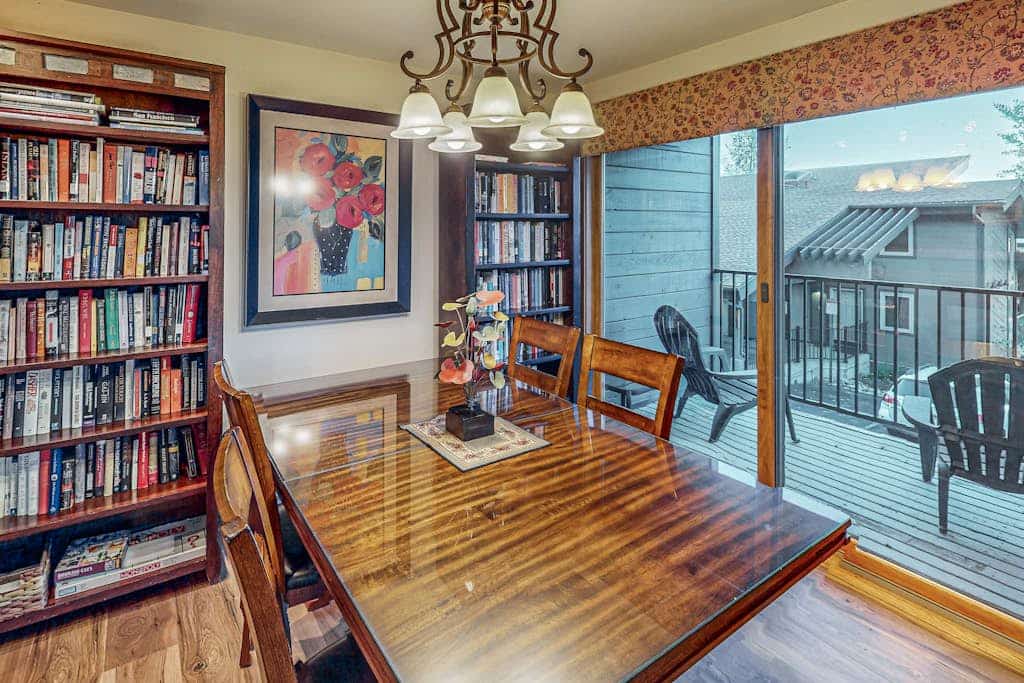 Snowbird-friendly with year-round hot tub, balcony & wood fireplace