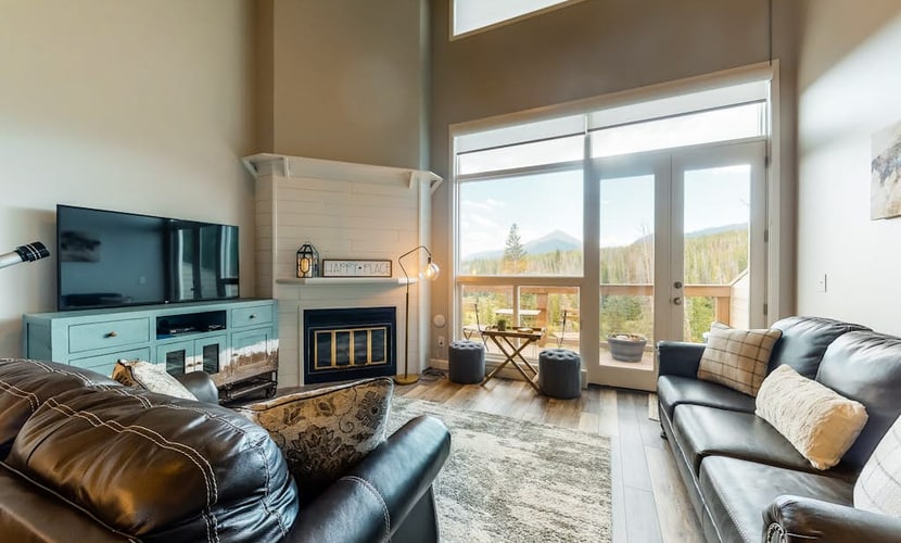 Modern condo with mountain views from balcony and gas fireplace