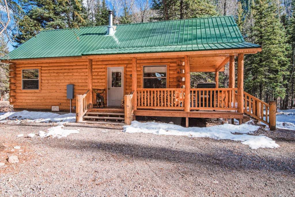 Waterfront cabin with bridge, private hot tub, & WiFi - near National Forest