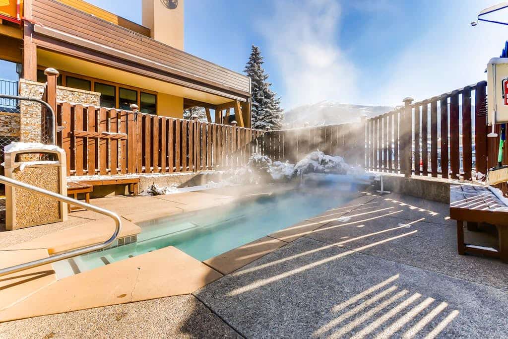 Top-floor mountain-view condo, steps from the gondola with pool & hot tub