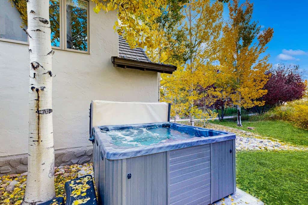 Spacious home w/ private hot tub, modern kitchen, grill & great location