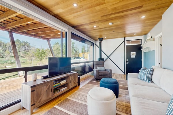 Secluded unique home in prime location with deck, woodstove, & mountain view
