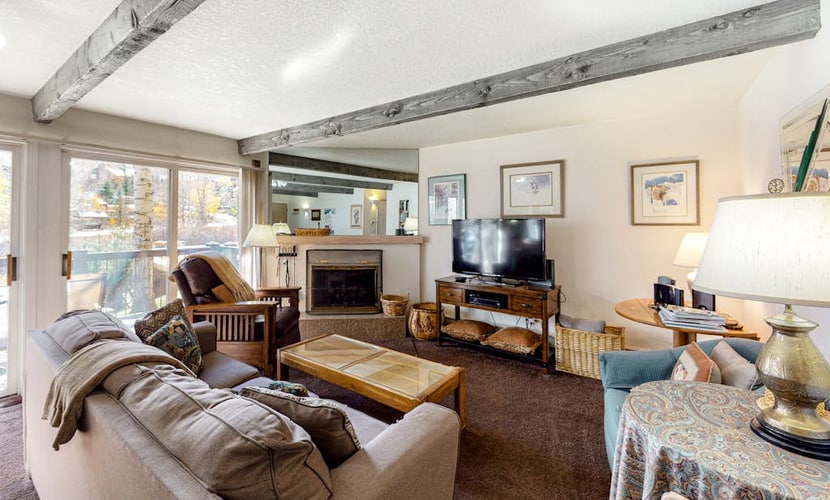 Charming Snowmass Village condo with fireplace, balcony, & amazing views