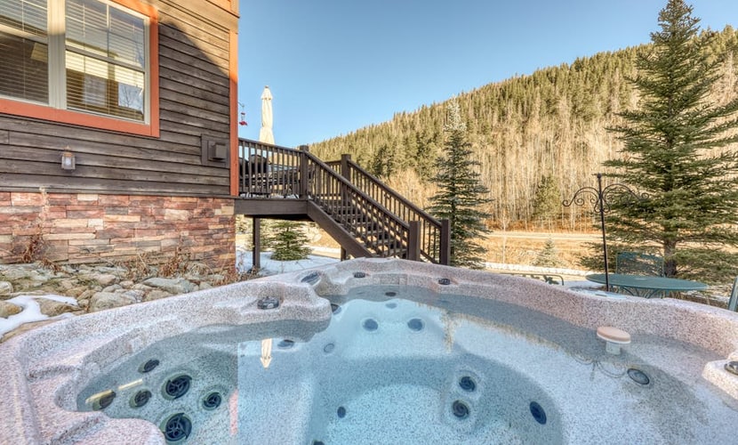 Modern luxury in dog-friendly home with hot tub and mountain views